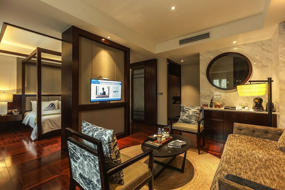 Фото Hejing Chengshang Generations Hotel