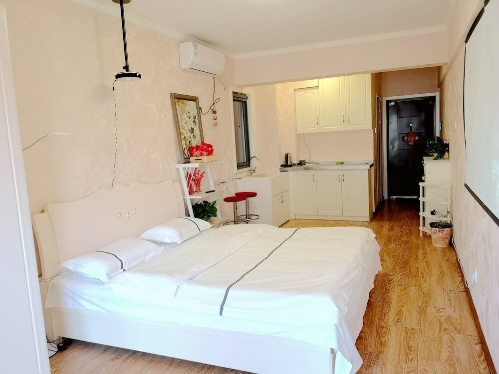 Фото Xiwangju Apart-hotel