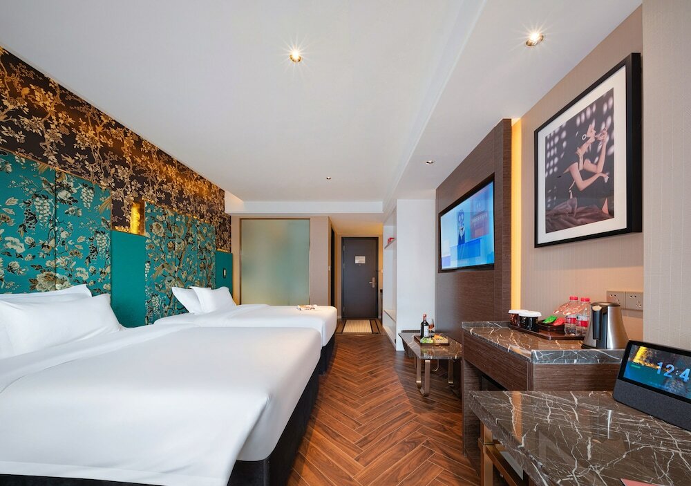 Фото Zhangjiajie Metrepolo Hotel