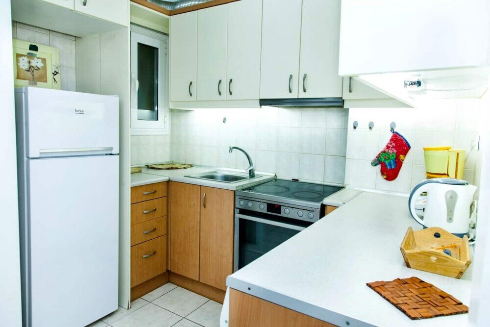 Фото Cozy apt in the center of Athens