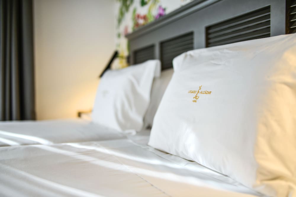 Фото Legado Alcázar Hotel