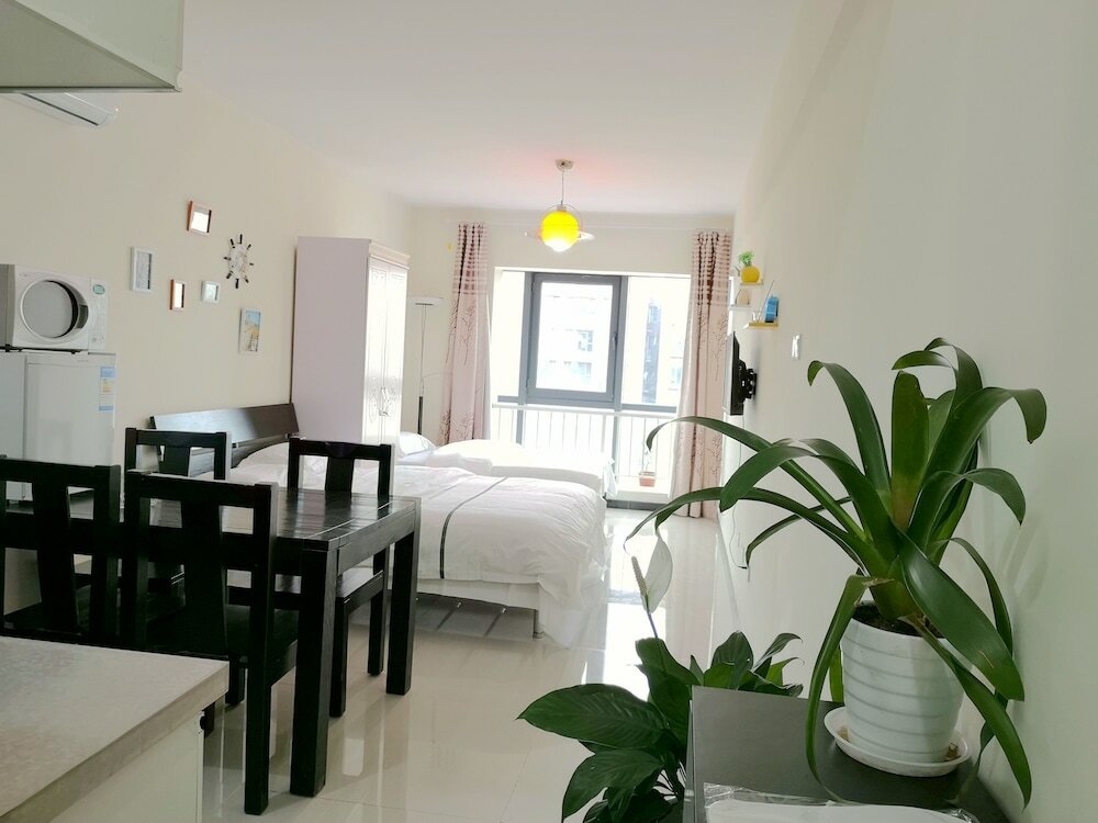 Фото Xiwangju Apart-hotel