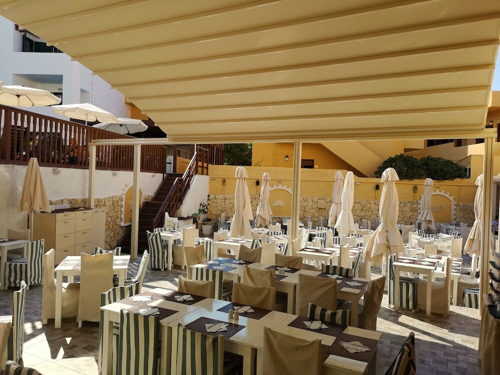 Фото Porto Greco Village Beach Hotel