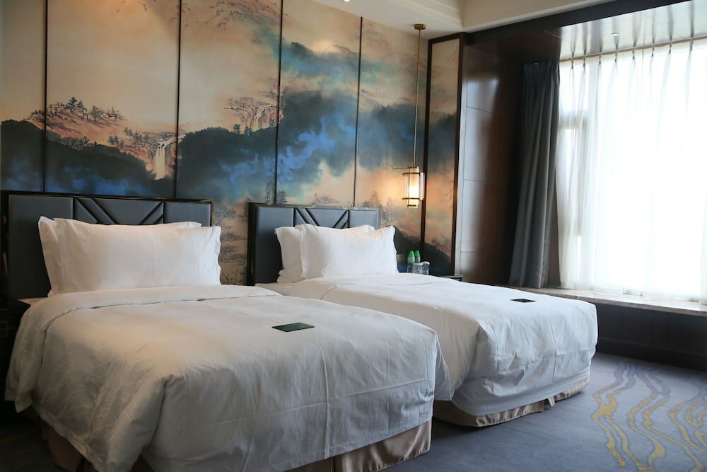 Фото Chateau Star River Qing Dao