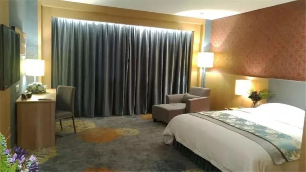 Фото Junyi Wangchao Hotel