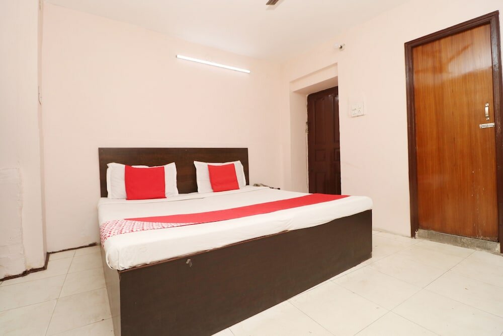 Фото Oyo 30274 Temple City Guest House