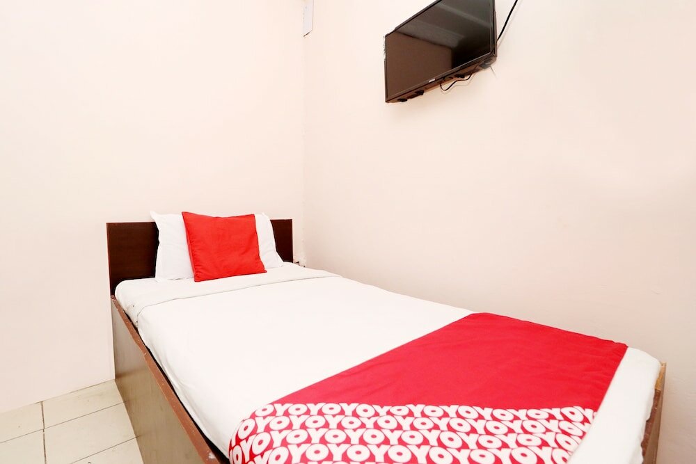 Фото Oyo 30274 Temple City Guest House
