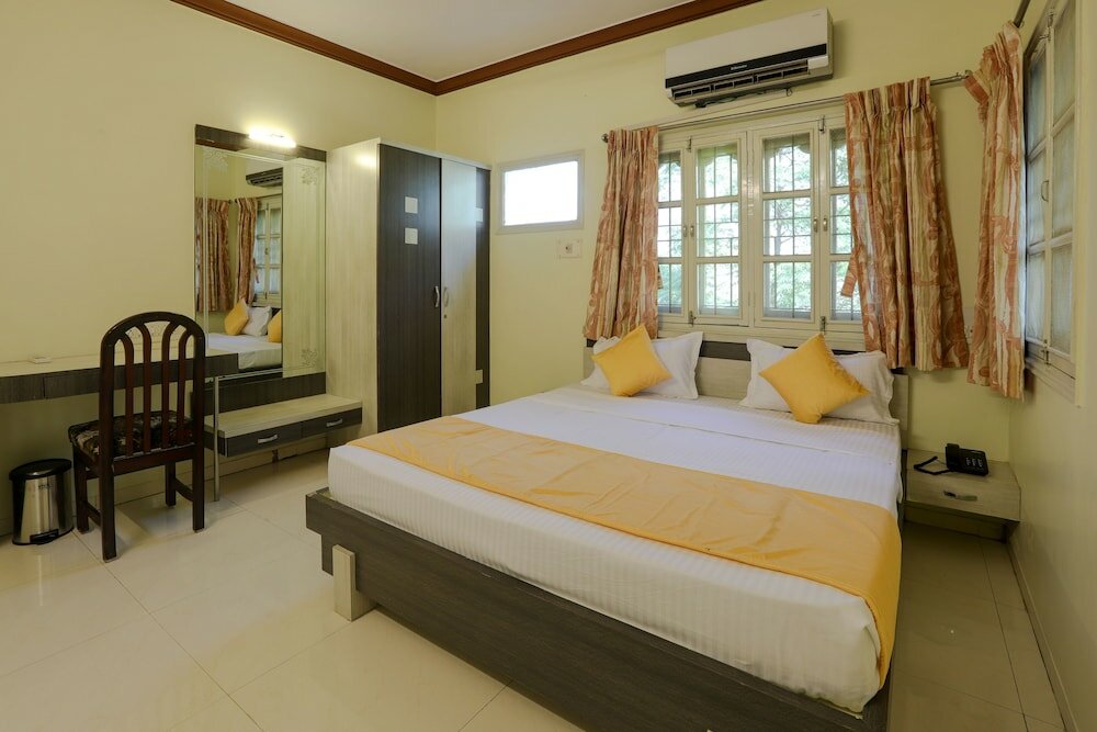 Фото Oyo 10031 Wind Chimes Boutique Guest House