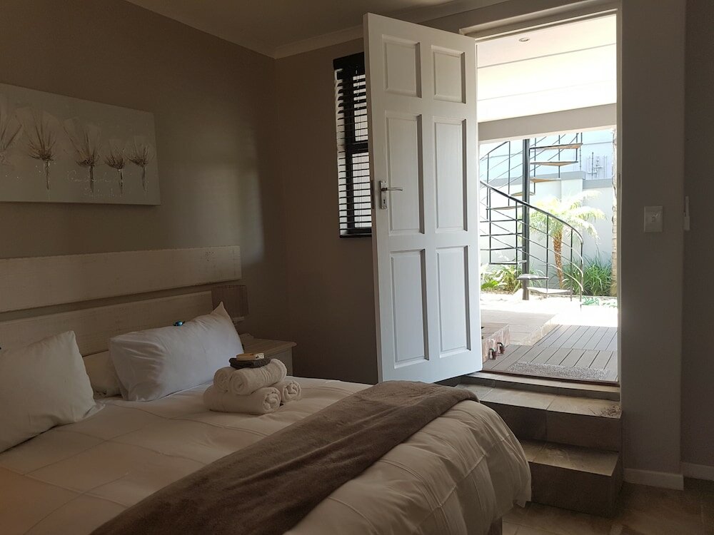 Фото Melkbosch Guesthouse