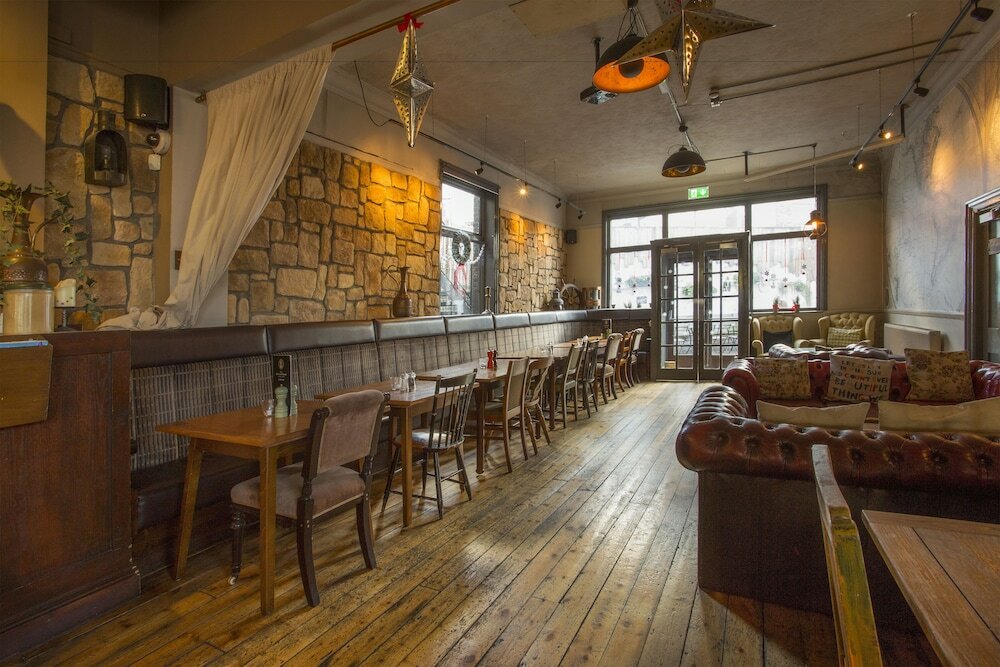 Фото The Captain Cook Hotel