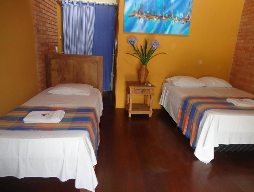 Фото Hotel Pousada Chalé Das Flores