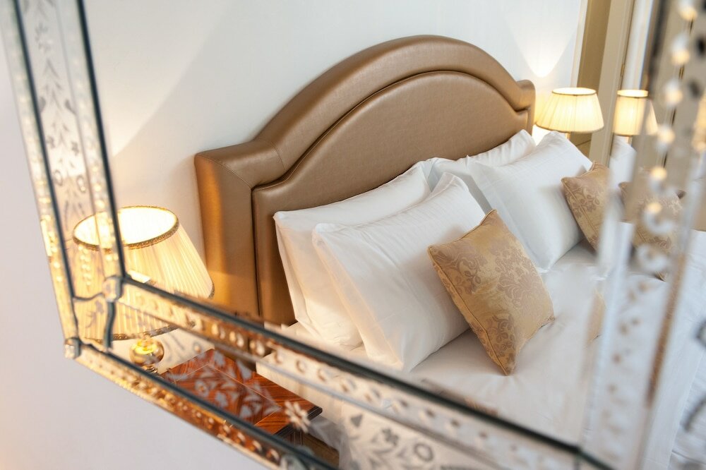 Фото San Teodoro Palace Luxury Apartments