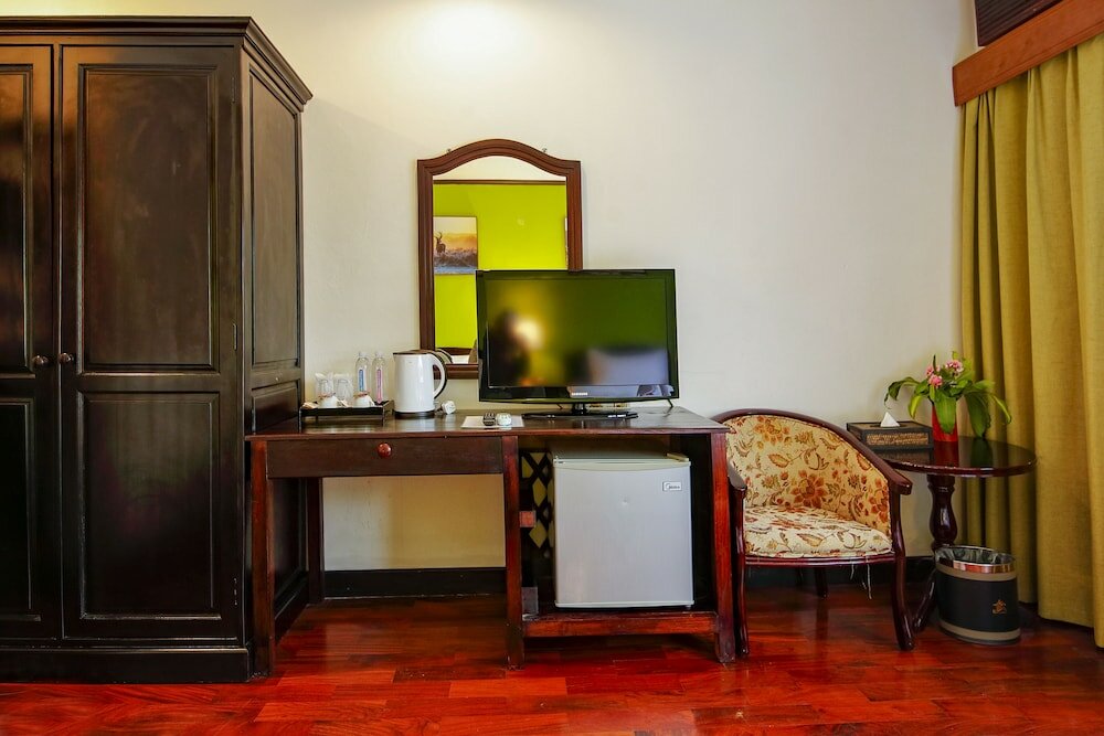 Фото E-Outfitting Vang Thong Hotel