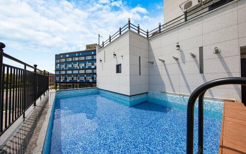 Гостевой дом Gangneung Nishi SPA Pension в Канныне