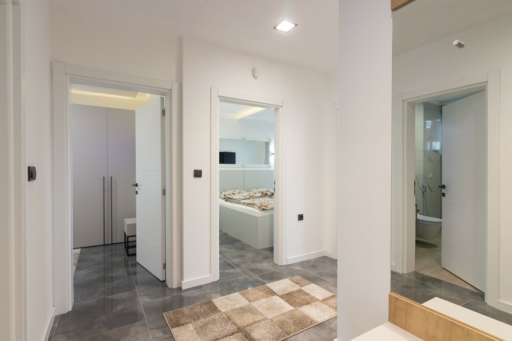 Фото Deluxe Feliciano Apartments