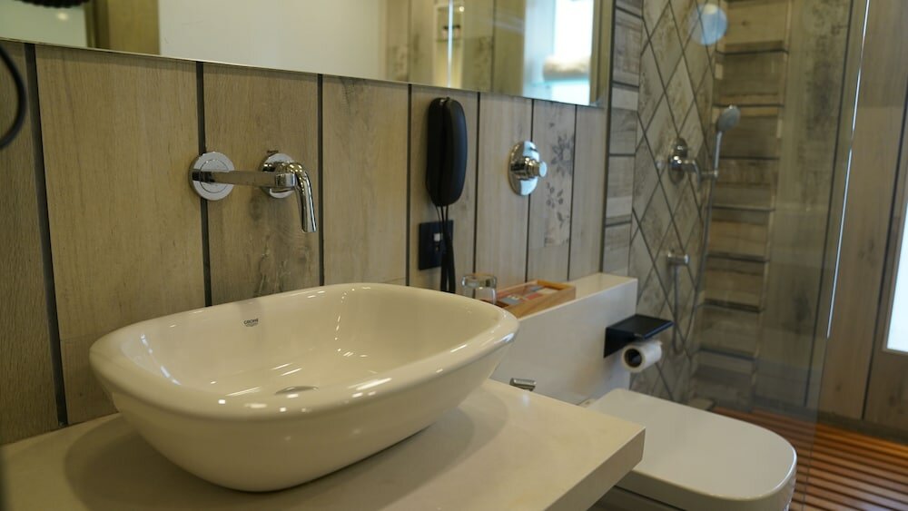 Фото De Glance Hotel