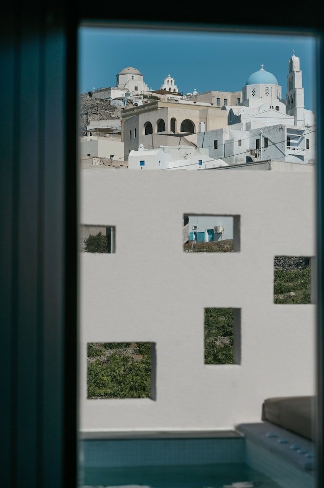 Фото Elements Cozy Suites