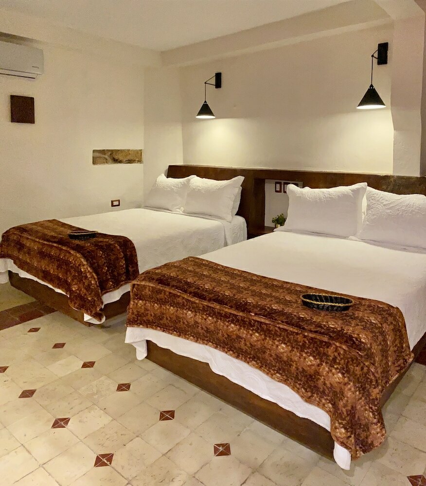 Фото Kuxtal Hotel Boutique