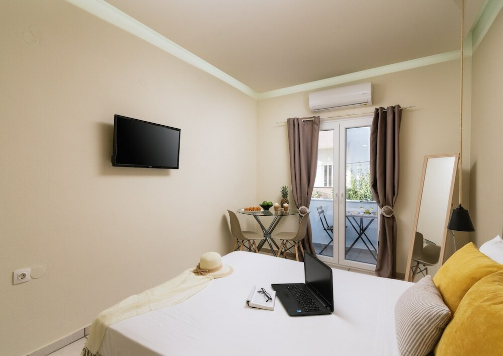 Фото Ermis Luxury Suites & Apartments