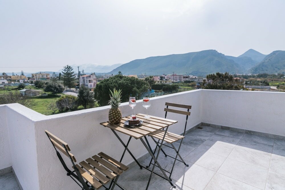 Фото Ermis Luxury Suites & Apartments