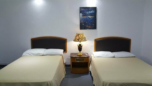 Гостиница Lorilynns Hotel Tinian