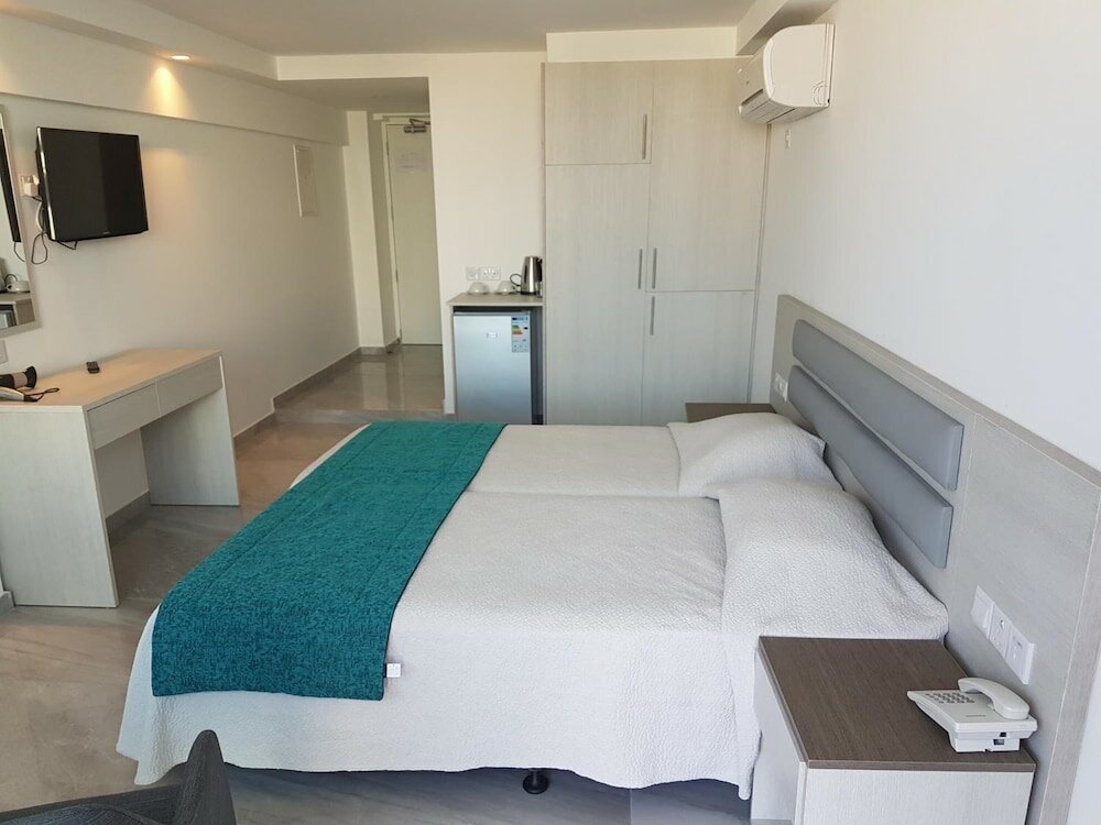 Фото Melini Hotel Suites