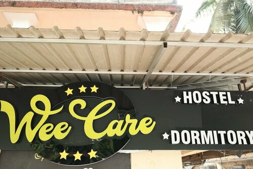 Гостиница Wee care hostel and dormitory в Мапусе