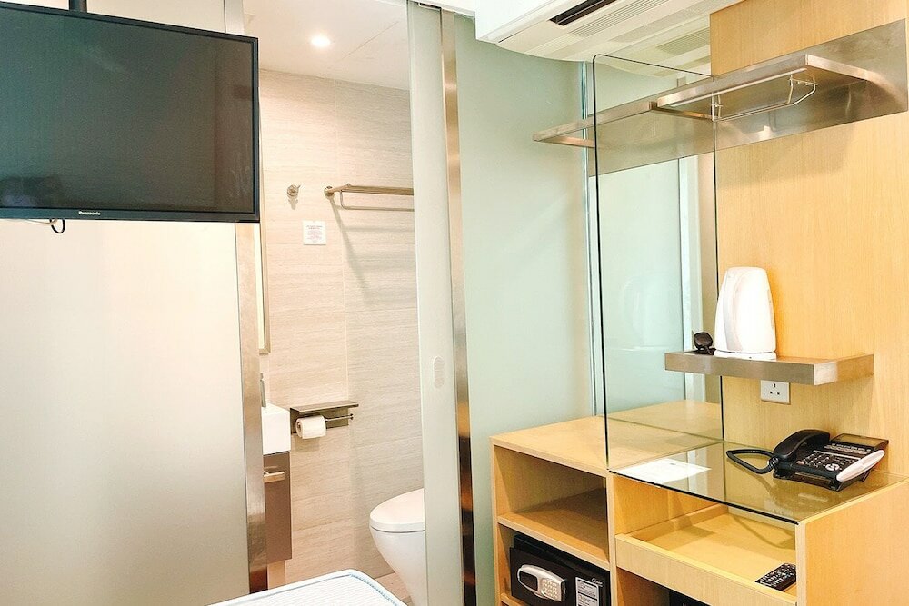 Фото Shingting Living Hotel Apartment