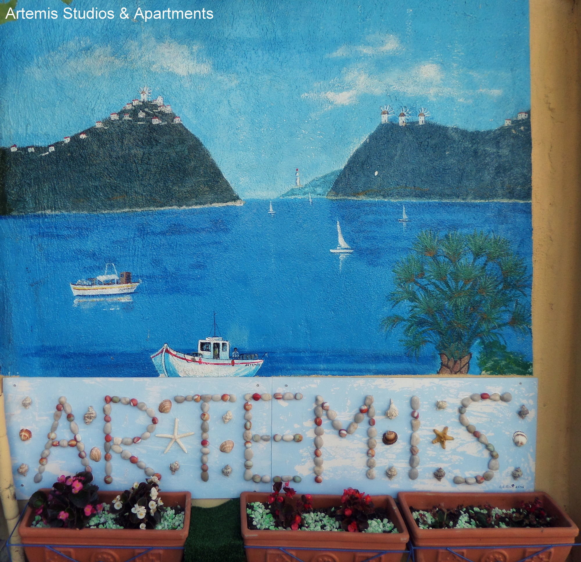 Фото Artemis Studios & Apartments