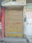 S. A button corner and tuck shop (Khizer Road, 399), clothing store