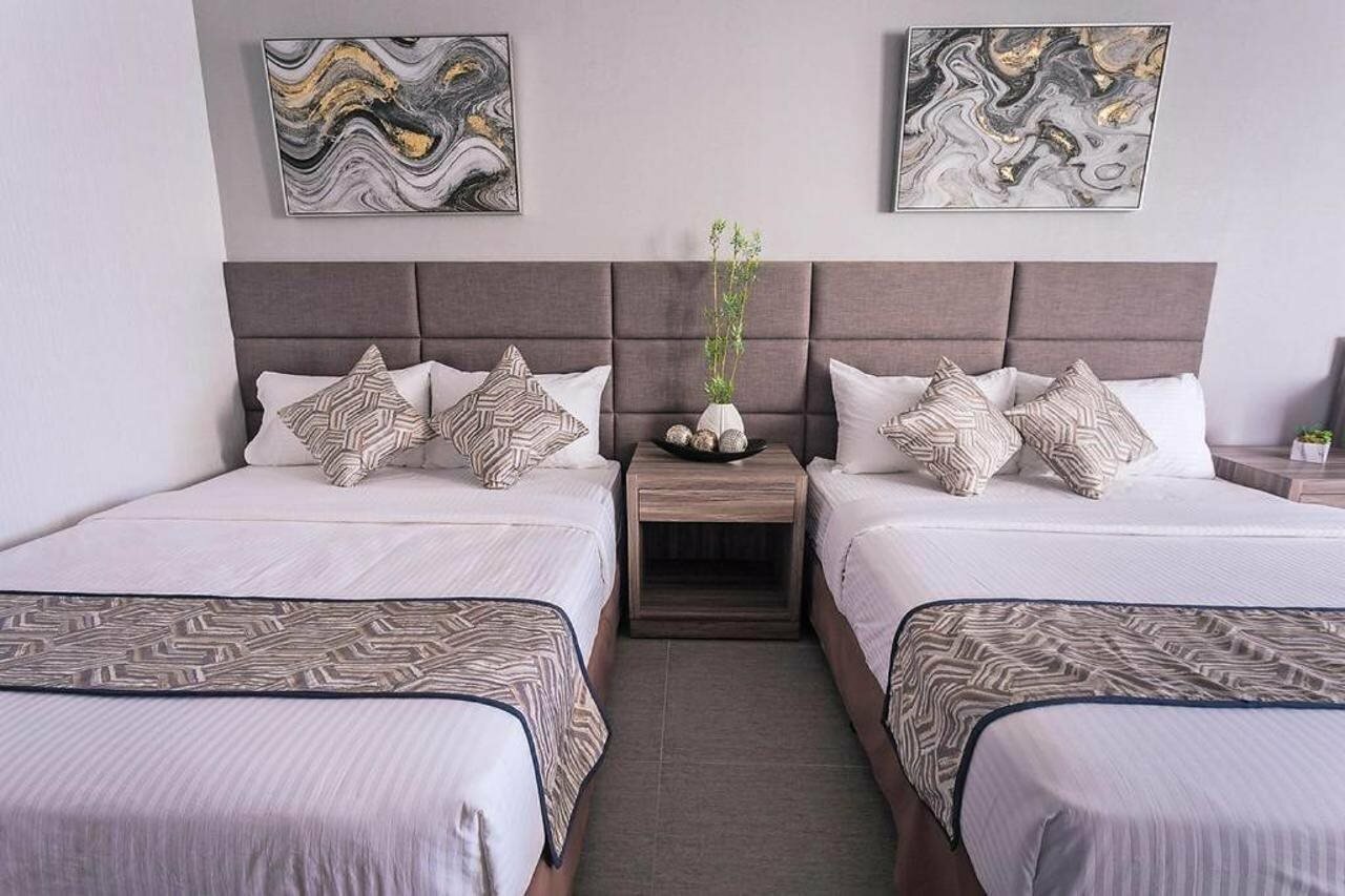 Фото Oyo 208 Anika Suites