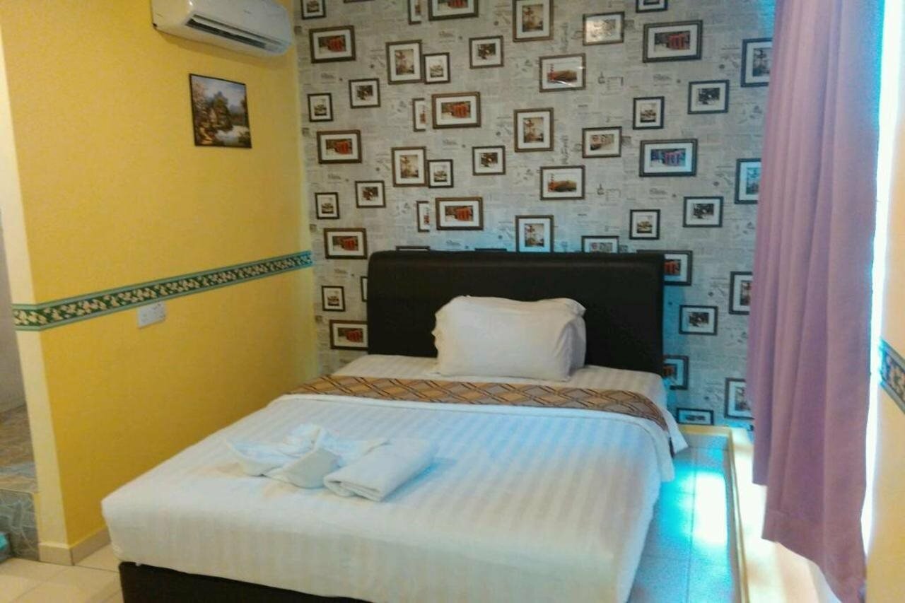 Фото Hotel Zamburger Sungai Besi