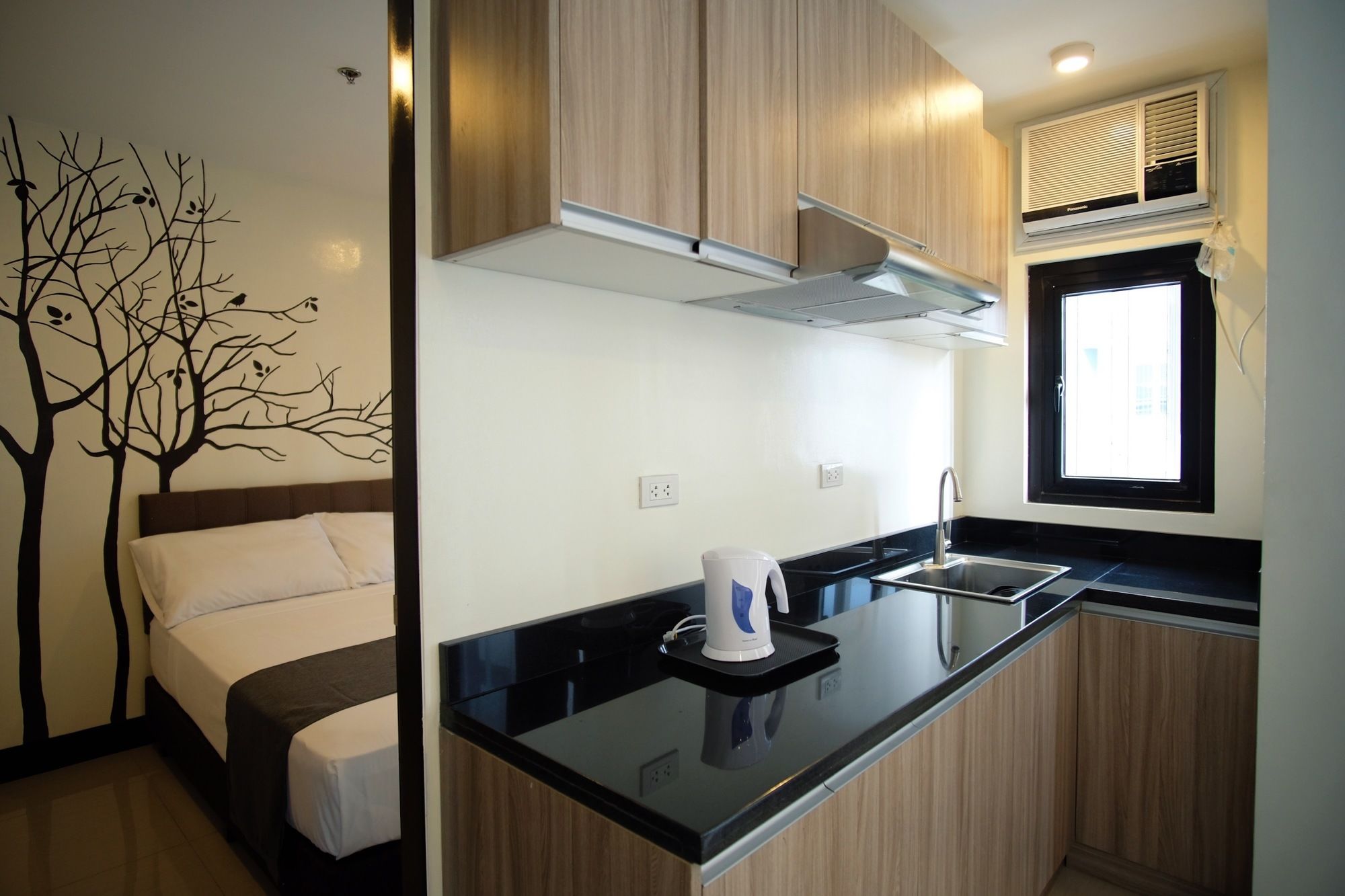 Фото Artemis Place Makati Hotel