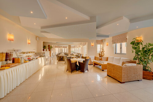 Гостиница Sunrise Beach Suites в Сиросе