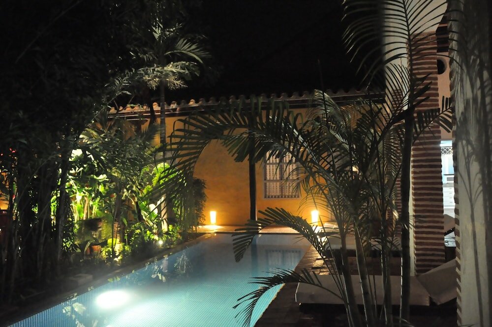 Фото Hotel El Candil de los Santos