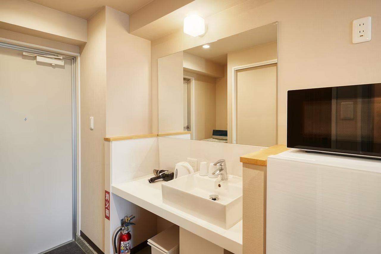 Фото New Normal Hotel in Matsuyama