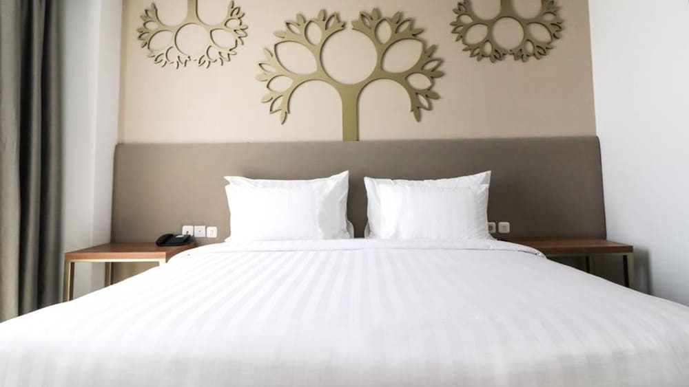 Фото Palm Park Hotel Surabaya