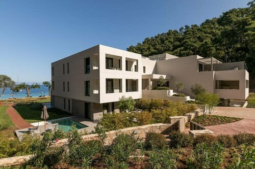 Гостиница Vathi Cove Luxury Resort & SPA