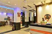 Фото Hotel Amax Inn