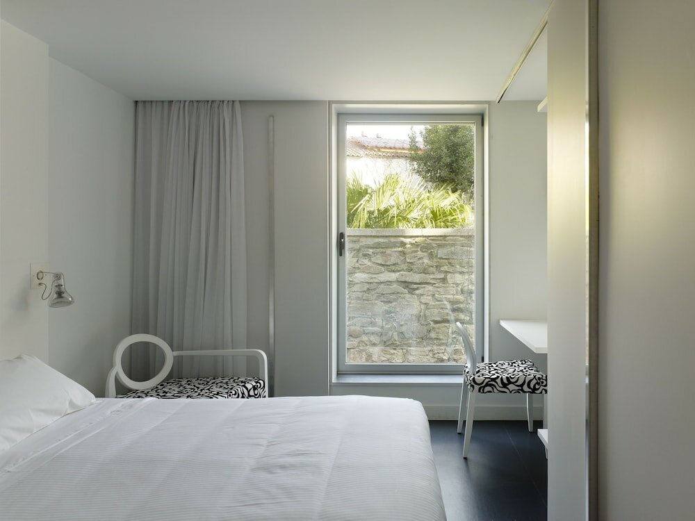 Фото Moure Hotel