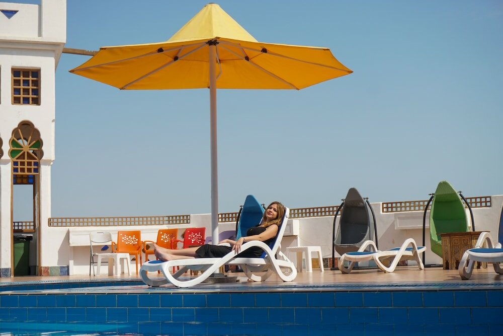 Фото Kuwait Palace Hotel Apartments