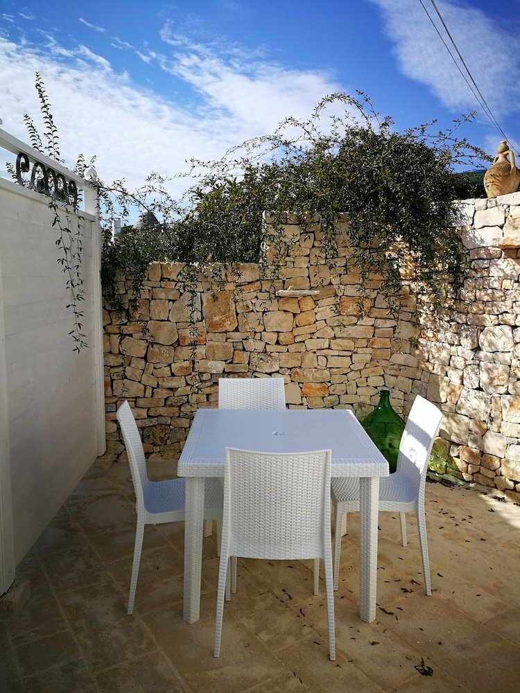 Фото Trulli Holiday Albergo Diffuso