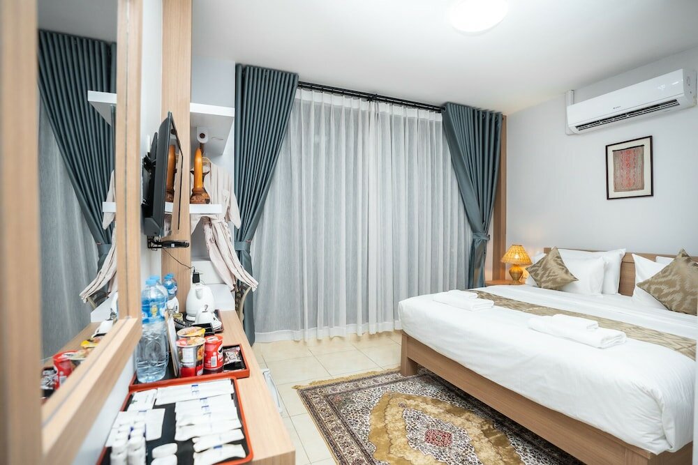 Фото Vongkhamsene Boutique Hotel