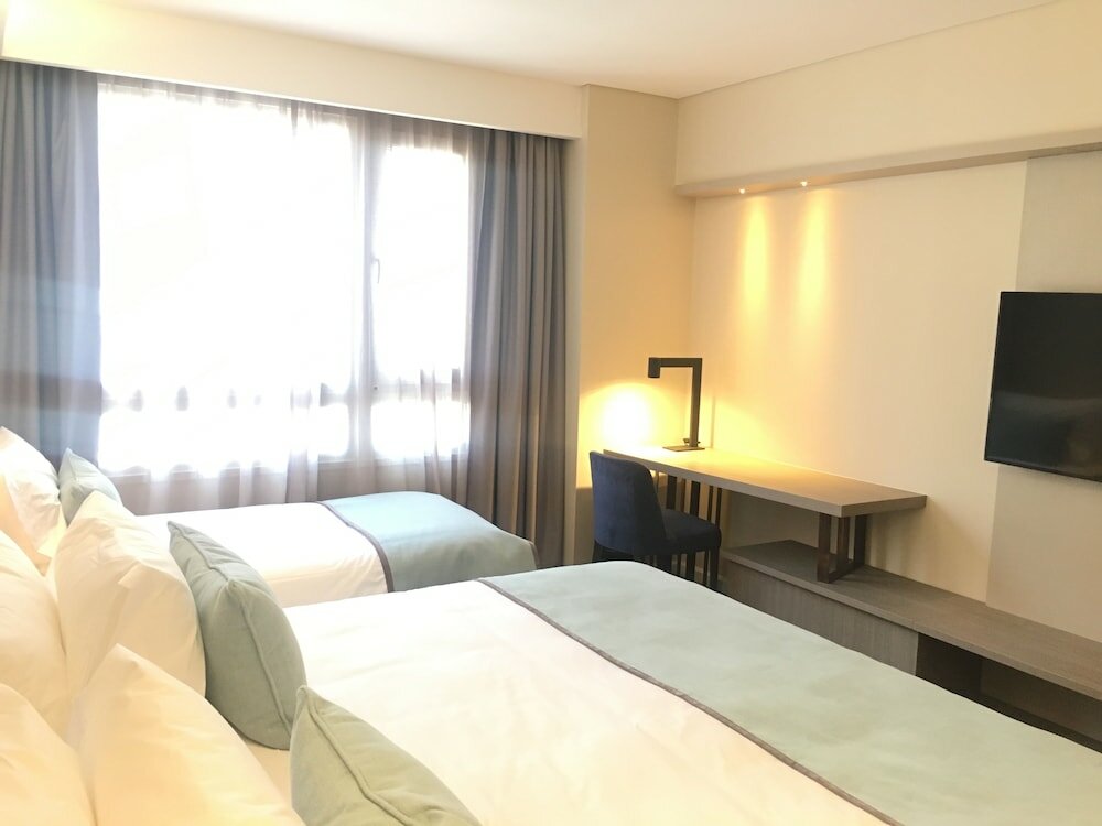 Фото Huinid Obelisco Hotel