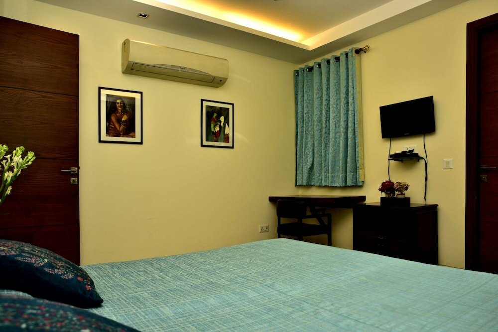 Фото Woodpecker Service Apartments Green Park