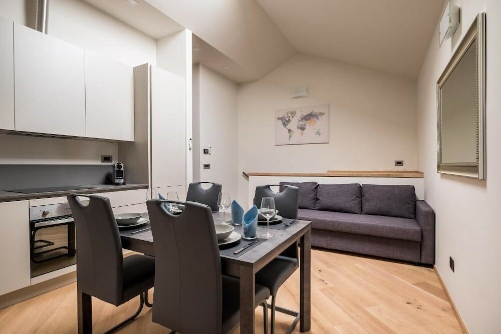 Фото Sant'orsola Suites Apartments