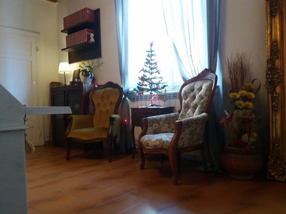 Фото La Maison del Corso B&b