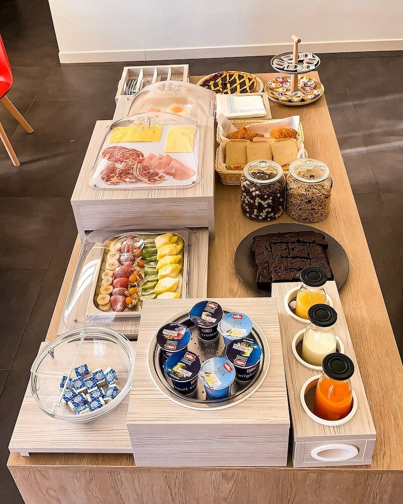 Фото Napoli Squares Suites