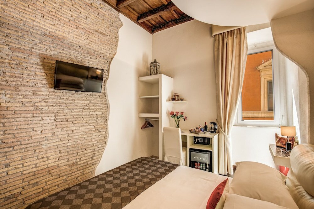 Фото Piazza di Spagna Comfort Rooms