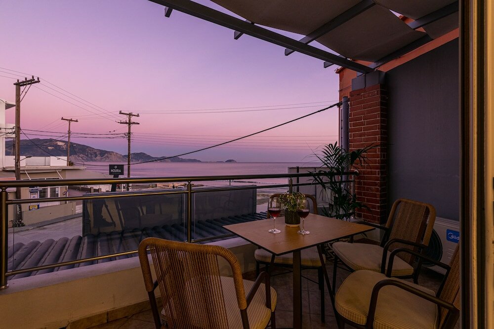 Фото Mouria Studios & Apartments